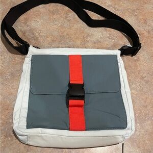 Stylish Gray and White Men's Bag with Red Accent